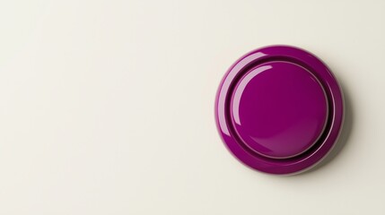 A vibrant purple button on a light-colored surface, creating a striking visual contrast and a modern aesthetic.