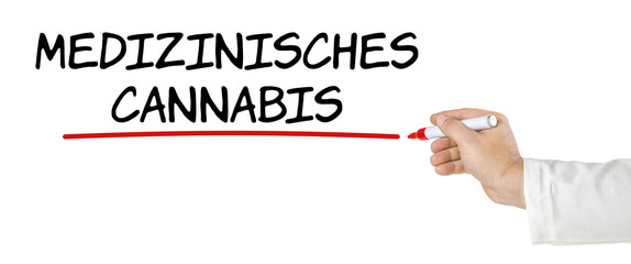 Hand mit Stift schreibt Medizinisches Cannabis