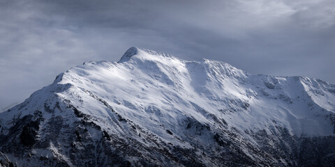 Panorama of the Mont Bellachat in the French Alps, Savoie. Sunlight on the summit