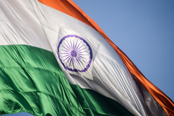 India flag flying high at Connaught Place with pride in blue sky, India flag fluttering, Indian Flag on Independence Day and Republic Day of India, tilt up shot, Waving Indian flag, Har Ghar Tiranga