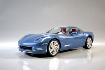 A blue sports car sits on a gray floor.