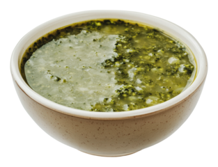 Delicious green soup served in a traditional bowl, cut out - stock png.