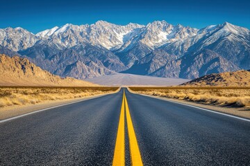 Naklejka premium A long road leading to the mountains