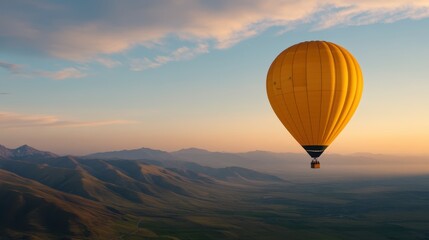 Obraz premium A vibrant yellow hot air balloon floats gracefully above rolling hills at sunset, creating a serene and picturesque scene, Perfect for travel blogs, adventure promotions, or inspirational imagery,