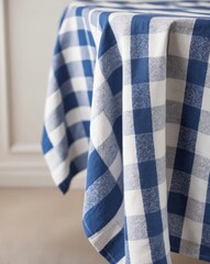 Fototapeta premium a close up of a blue and white checkered table cloth.