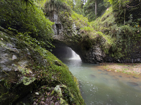 Natural Arch and waterfall, Springbrook National Park, Gold Coast Hinterland, Queensland, Australia