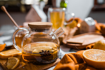 jar of honey, honey spoon, tea in a glass teapot, lemon, autumn mood, tea for colds