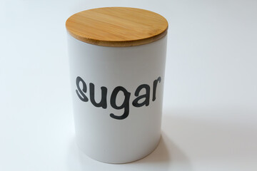 Metal container with wooden retractable lid for sugar storing