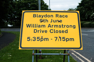 Newcastle UK: 8th June 2024 Blaydon Races traffic sign. Notice of William Armstrong Drive closure for Blaydon Race event