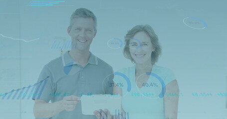 Analyzing financial data on tablet, business people over stock market charts and graphs image