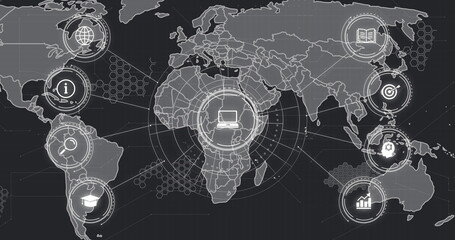 Digital world map with laptop icon and data processing image over continents