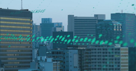 Image of diagrams and data processing over cityscape