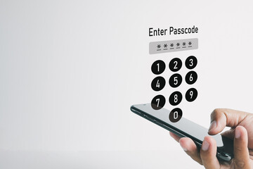 Mobile phone displaying passcode input screen, emphasizing data safety,cybersecurity,personal data...