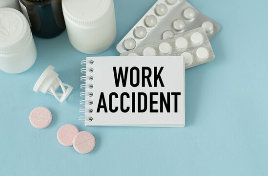 Holding a Card with text Work Accident medical concept