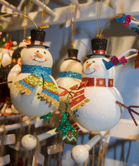 Obraz premium Christmas tree toys-snowmen, close-up