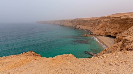 Dramatic Coastal Cliff  Foggy Ocean  Sandy Beach  Turquoise Water  Desert Landscape
