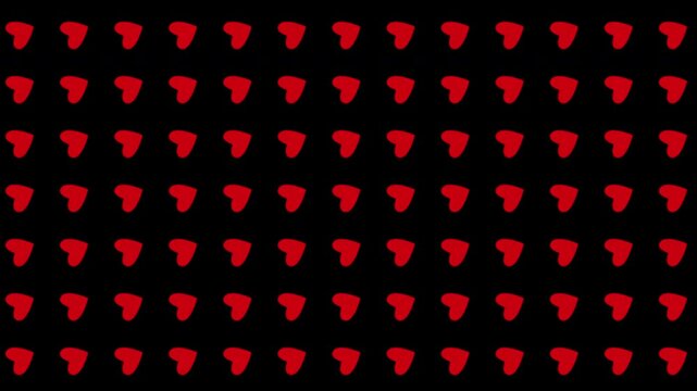 On a transparent background there is a pattern of red hearts that rotate around their axis and increase and decrease imitating a heartbeat . Animated background for Valentine's Day.