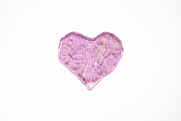 Pink Heart shaped water gel on white isolated background