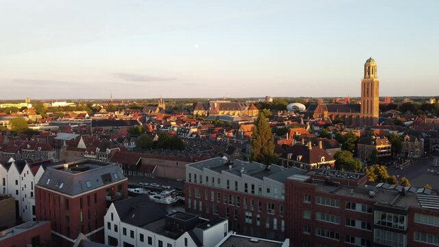 Zwolle, the Netherlands - June 19th 2024: Drone flying sideways over the city center towards the Peperbus.