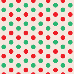 Red and Green Polka dots seamless pattern in Christmas colors. For Christmas wrapping paper, fabric and textile.
