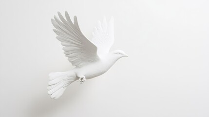 Fototapeta premium Plaster statue of a bird in mid-flight, capturing movement and lightness