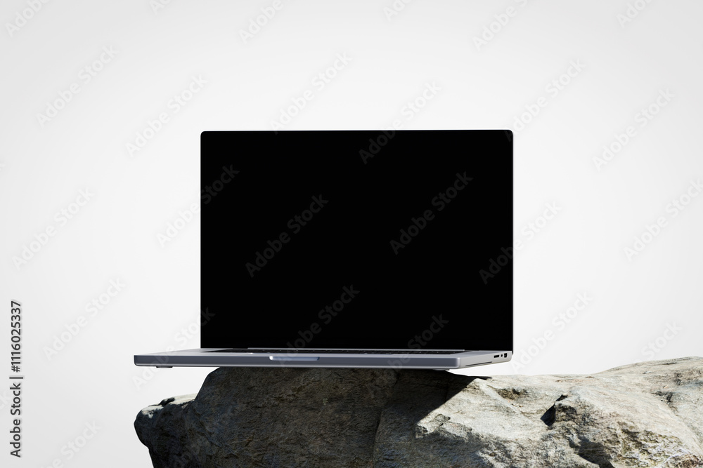 Canvas Prints scene with a opened laptop with a blank screen on the rock