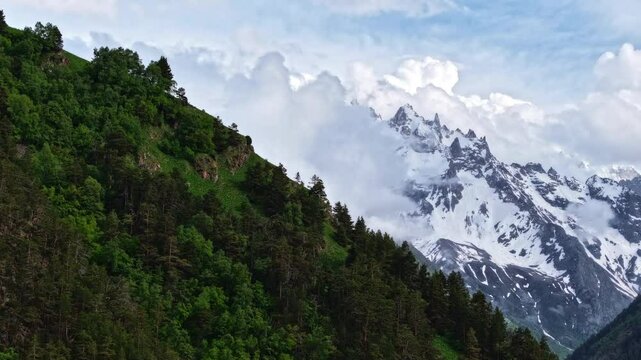 Clouds moving over mountain peaks timelapse