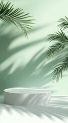 Obraz premium Minimalist design scene with green palm leaf shadows and white podium creating a serene and stylish backdrop for product display or creative concepts.