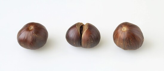 Obraz premium Delicious roasted chestnuts freshly prepared for winter snacks on a clean background