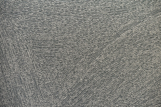 The background is from the texture of gray wallpaper.