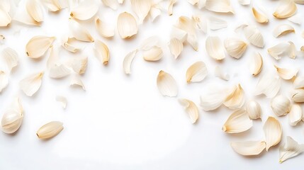 Garlic Cloves and Skins on White Background