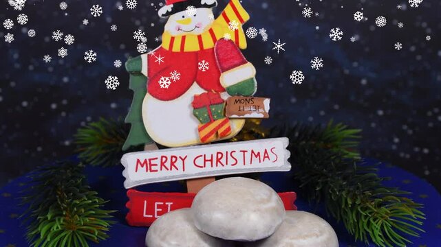 Santa Claus with Merry Christmas and advent wreath, igniting the fourth candle