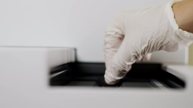 Loading a Microarray Slide into Laboratory Scanner.