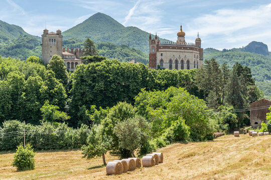 Hay bales near the ancient Rocchetta Mattei, Grizzana Morandi, Italy