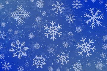 Falling snowflakes on blue background. Winter background, snowflakes on a beautiful background