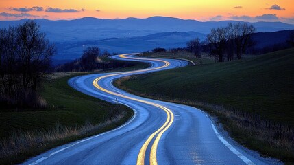 Serene Winding Road at Dusk with Beautiful Landscape and Dramatic Sky in Background