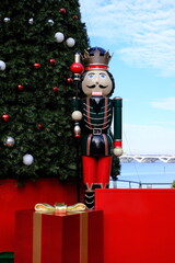 Large nutcracker and Christmas tree display