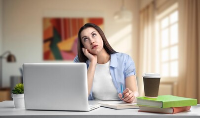 Serious student woman study with a laptop