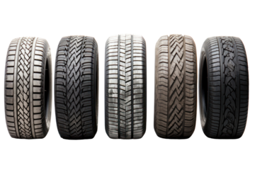 A collection of different types of car tires, including all-season, winter, and performance tires, arranged side by side to show their varying tread designs and sizes.