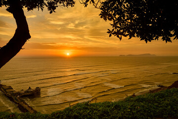 As the sun sets over San Lorenzo Island, the view from Miraflores becomes pure magic .The island silhouettes against a sky ablaze with color, while the ocean whispers of infinite horizons. 