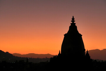 The silhouette, contour of the Shilu, Silu Mahadeva, Mahadev Temple in front of a colorful sky after sunset, Durbar Square, Bhaktapur, Nepal