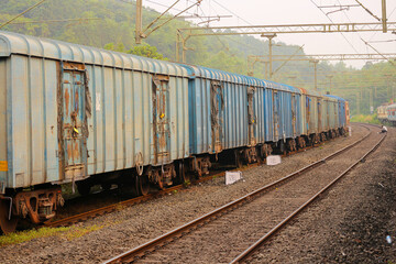 Obraz premium Old carriages of a freight train on Indian Railways.