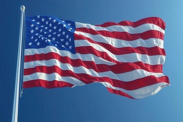 Obraz premium united states flag waving gracefully against a backdrop of a clear blue sky, symbolizing patriotism and national pride, with crisp details and vibrant colors enhancing the visual impact