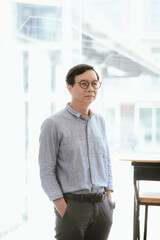Fototapeta premium Asian businessman in modern office