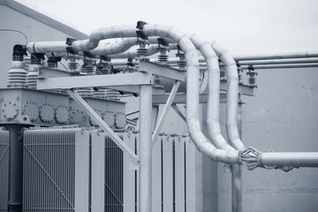 Electrical substation with high voltage switches, wires, transformer, ceramic insulators