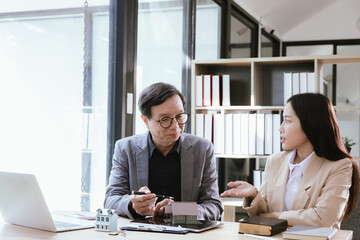 Business people signing contract making deal with real estate agent Concept for consultant home insurance Real estate investment Property insurance