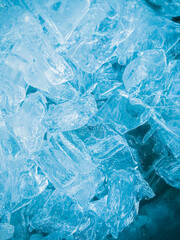 Fototapeta premium icecubes background,icecubes texture,icecubes wallpaper,ice helps to feel refreshed and cool water from the icecubes helps the water refresh your life and feel good.ice drinks for refreshment business