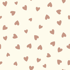 All over seamless vector repeat pattern with ditsy small earth tone driftwood color hand drawn doodle hearts tossed on cream background. Simple cute Valentines day backdrop