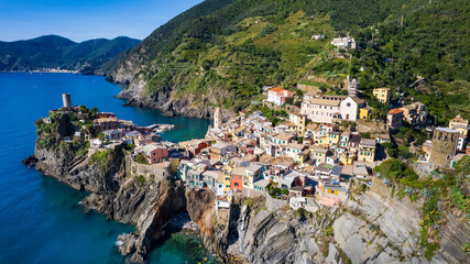 Italy, Cinque terre national park in Liguria. traditional fishing village Vernazza. Aerial view with colorful houses and picturesque bay. popular tourist attraction
