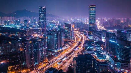 Fototapeta premium Stunning Aerial View of City Skyline at Night with Bright Lights